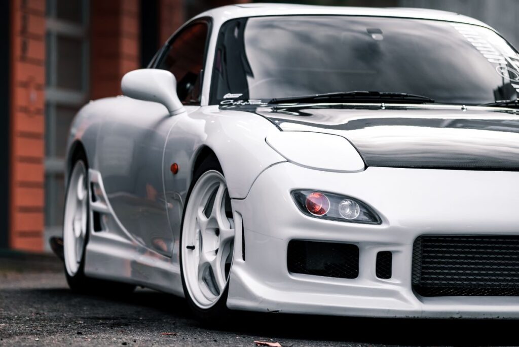 Parked white Mazda RX-7 FD
