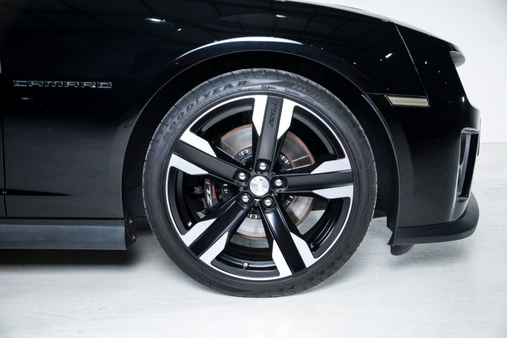 Close up of wheel with Goodyear tyre on a black Chevrolet Camaro ZL1 on August 23, 2017 in London, U.K.