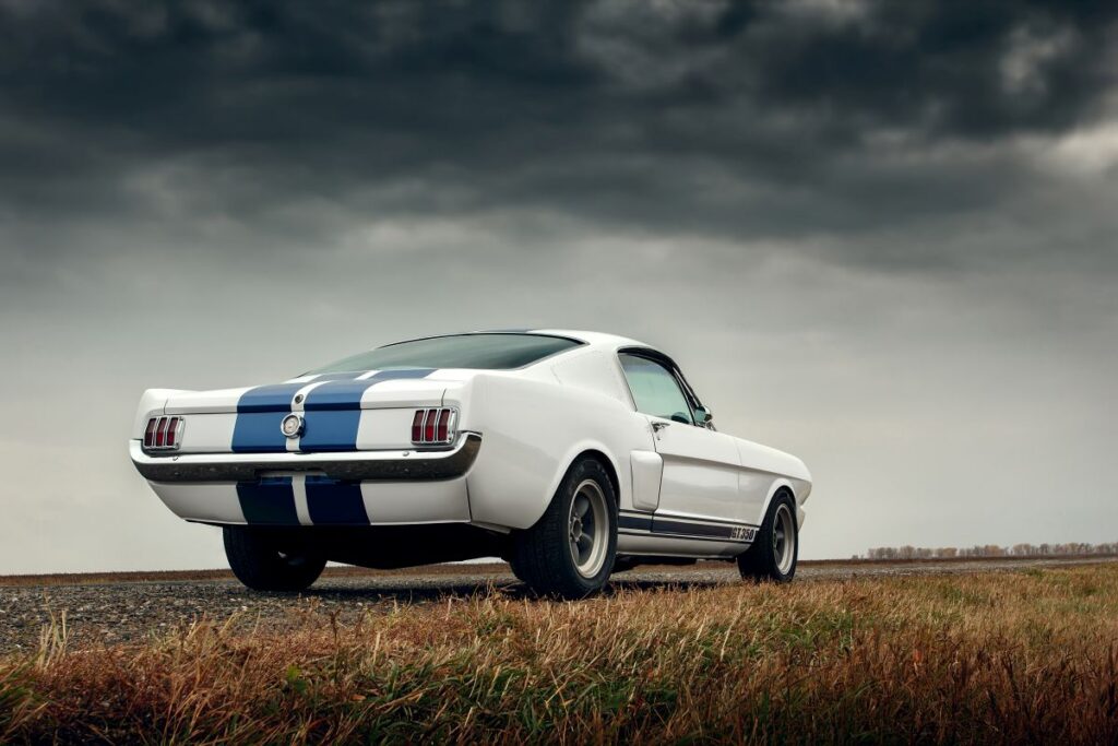 Old car Ford Mustang Shelby GT350 parked on a countryside road